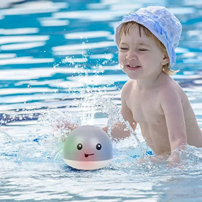 "Electric Whale Bath Ball: Water Spray Shower Toy with Light and Music